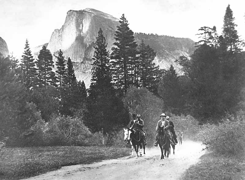 John Muir and Theodore Roosevelt on horseback in Yosemite Valley