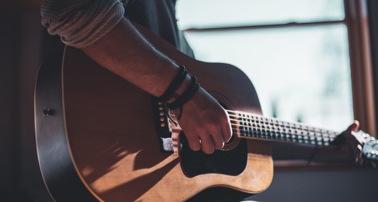 Musical Instrument Playing Music First Guitar Leather Accessories Home Studio man playing acoustic guitar selective focus photography