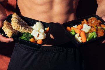 Healthy Eating Fitness Mistakes Beef Recipes topless man in black shorts holding cooked food