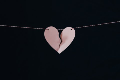 Divorce Attorney broken heart hanging on wire