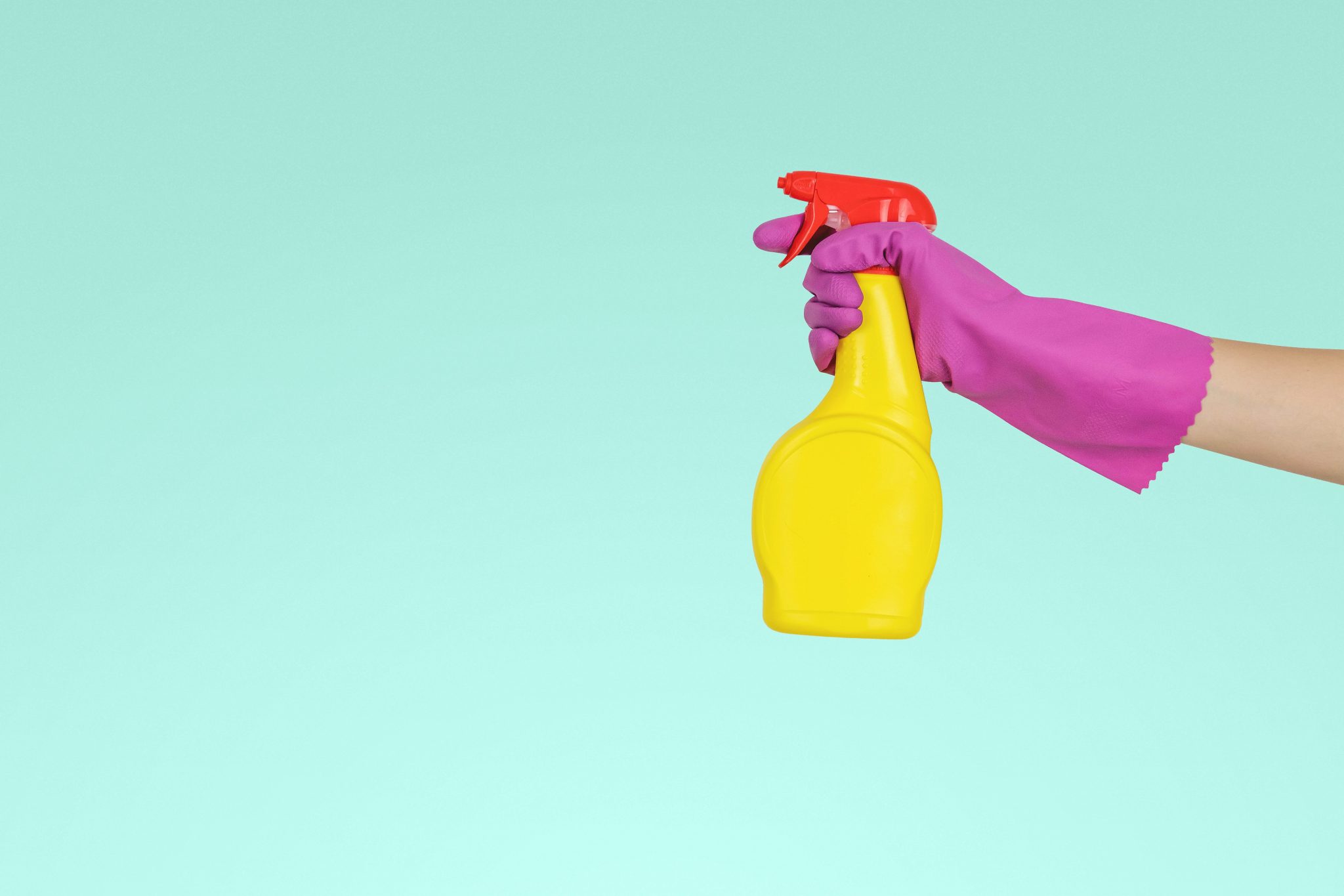 To Do Attention person holding yellow plastic spray bottle