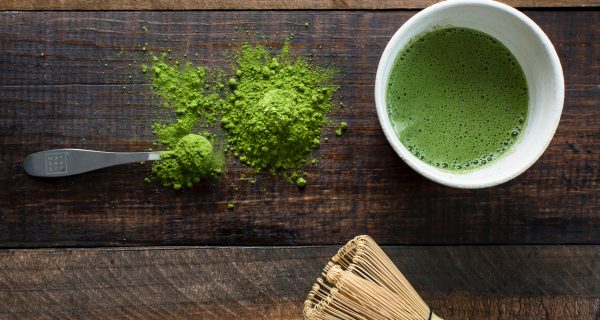 Red Bali Kratom Powder Kratom Online Tea Brewing Healthy Products kratom green plant in white ceramic mug beside brown wooden brush