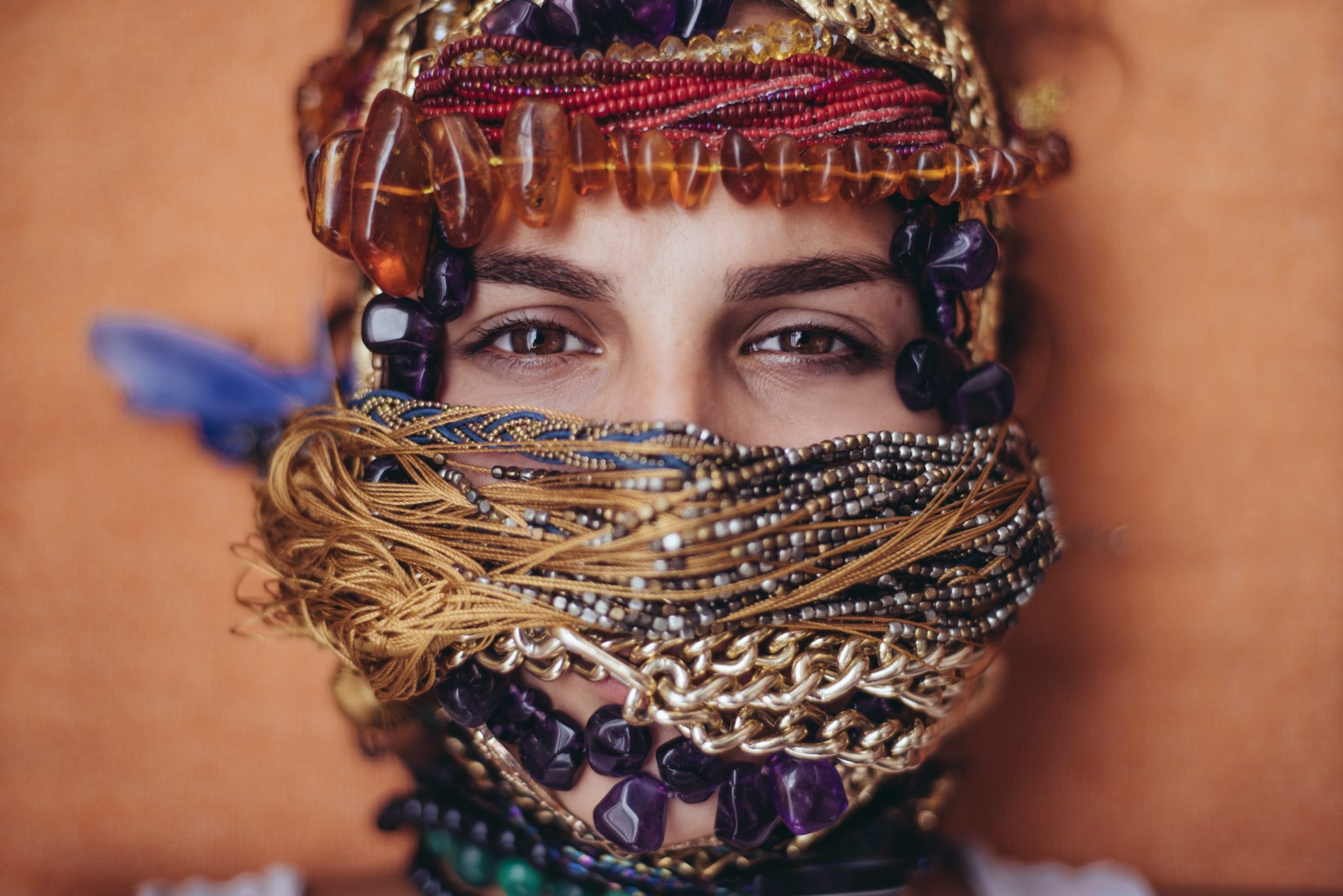 Teardrop Plugs shallow focus photography of woman covered of accessories