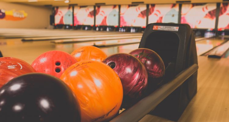 bowling balls on rack