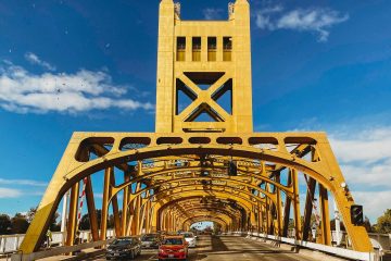 Sacramento cars on road under bridge during daytime