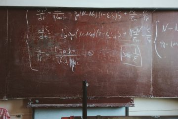 Midpoint Formula written equations on brown wooden board