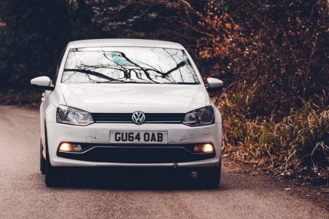 Cars for Students Purchasing your car Volkswagen Polo white car on road
