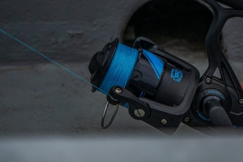 fishing equipment black and blue fishing reel