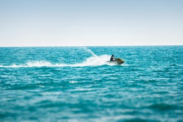 Water Sports man surfing on sea waves during daytime