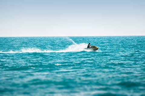 Water Sports man surfing on sea waves during daytime