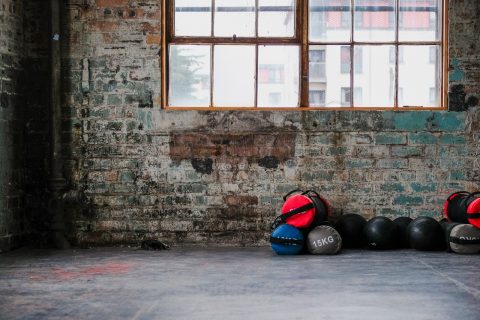 Workout weight bags on the floor near wall