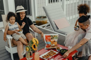 Parenting Dinner Party woman in black shirt sitting on chair