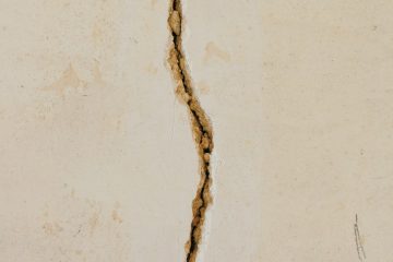 DIY House crack on white concrete surface