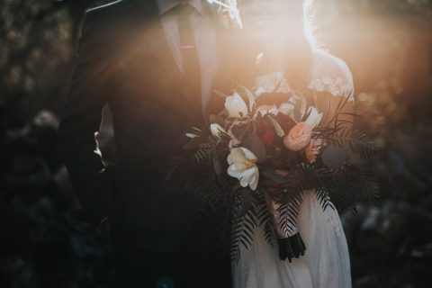 settle down Wedding groom beside bride holding bouquet flowers
