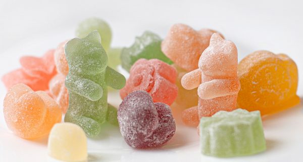 CBN gummies THC Cannabis CBD Gummies orange green and pink candies