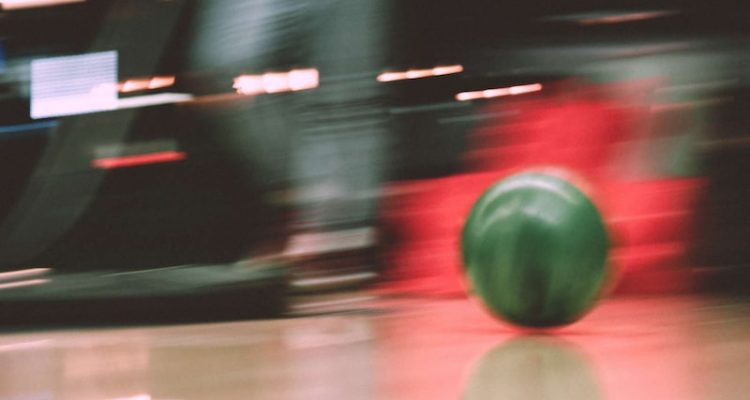 Bowling red round ball on the floor