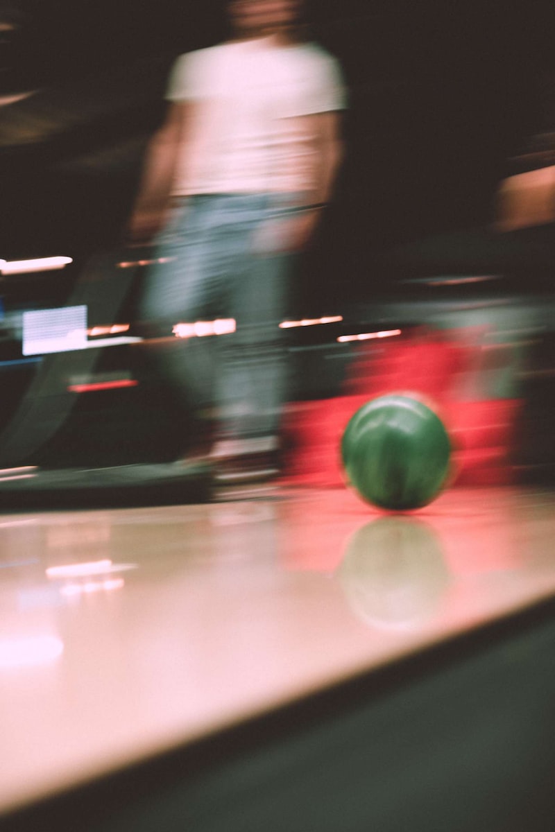 Bowling red round ball on the floor