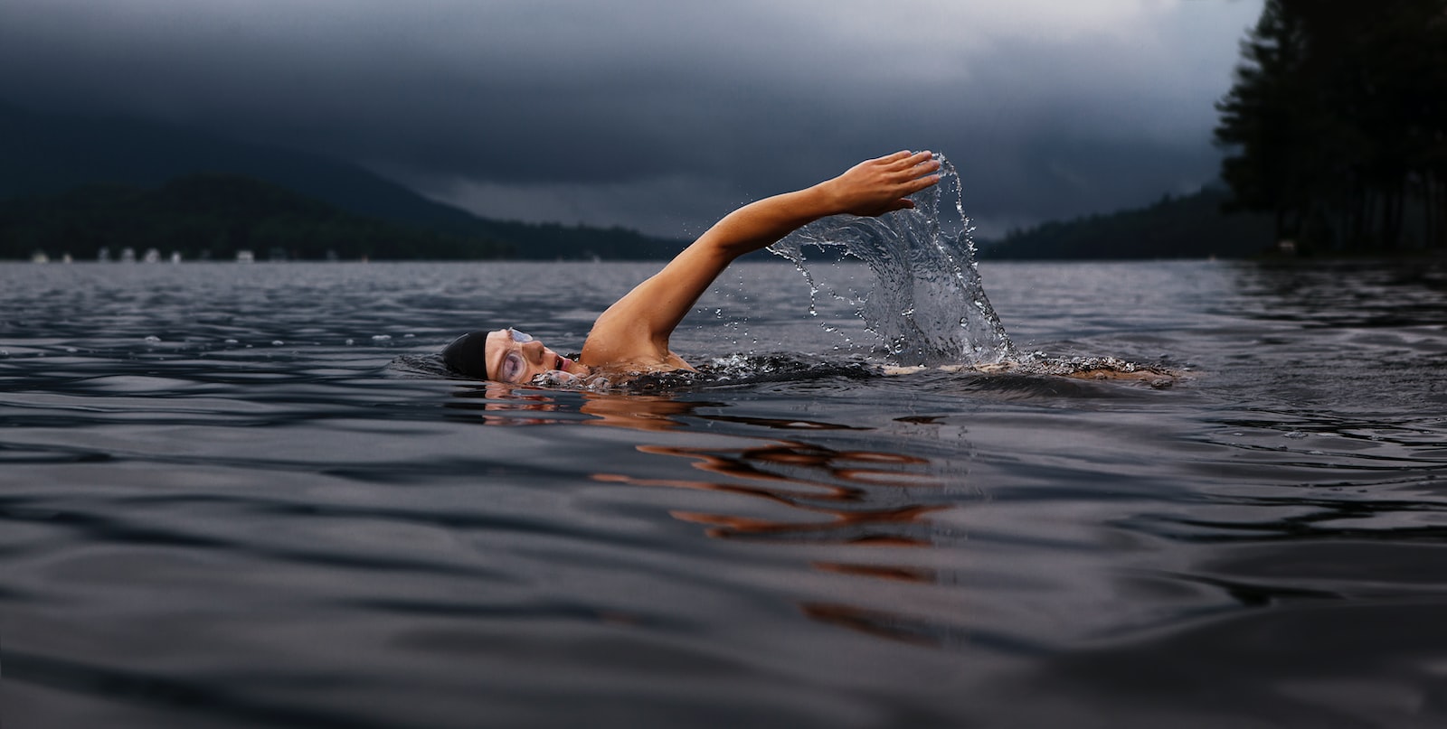 comfort zone train Sports swimmer man swimming on body of water