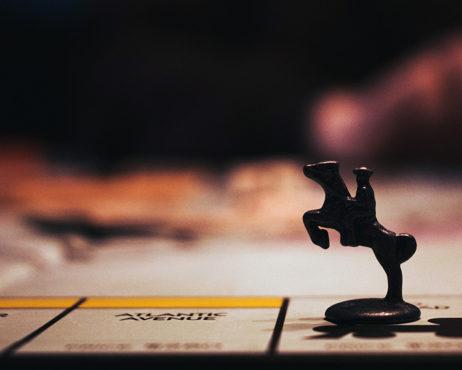 Tabletop gaming night in black wooden figurine on white paper