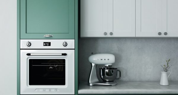 Cookbook Kitchen Appliances kitchen oven white ceramic mug on white ceramic saucer on white wooden cabinet