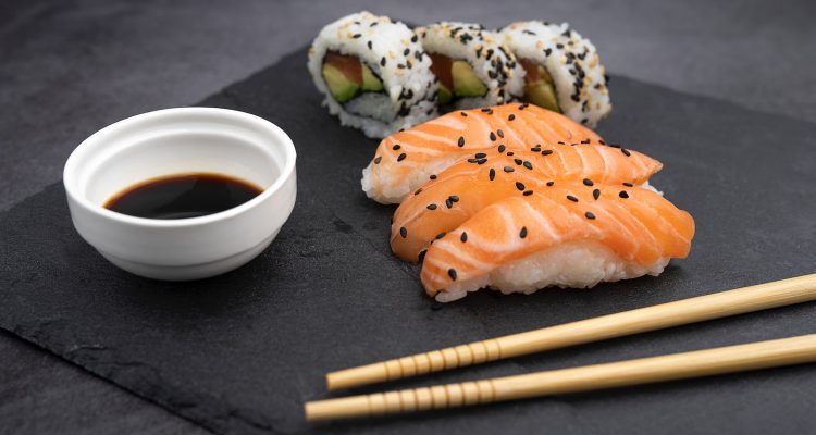Sushi on black table