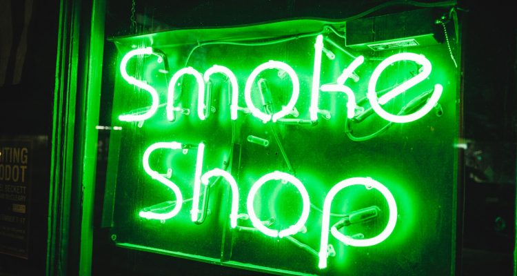 smoke shop turned on smoke shop NEON signage