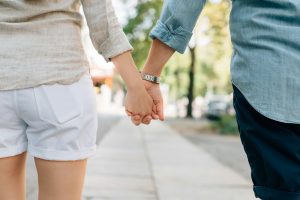 divorce date night connections man and woman holding hands together in walkway during daytime dating
