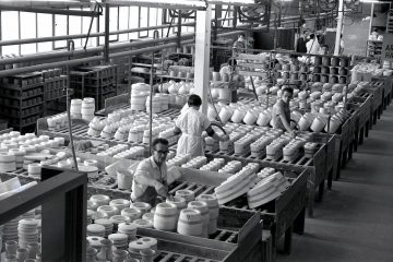 your factory a black and white photo of workers in a factory