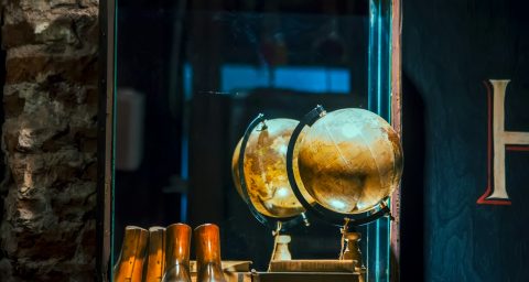 Heritage tradition mirror beige desk globe front of mirror