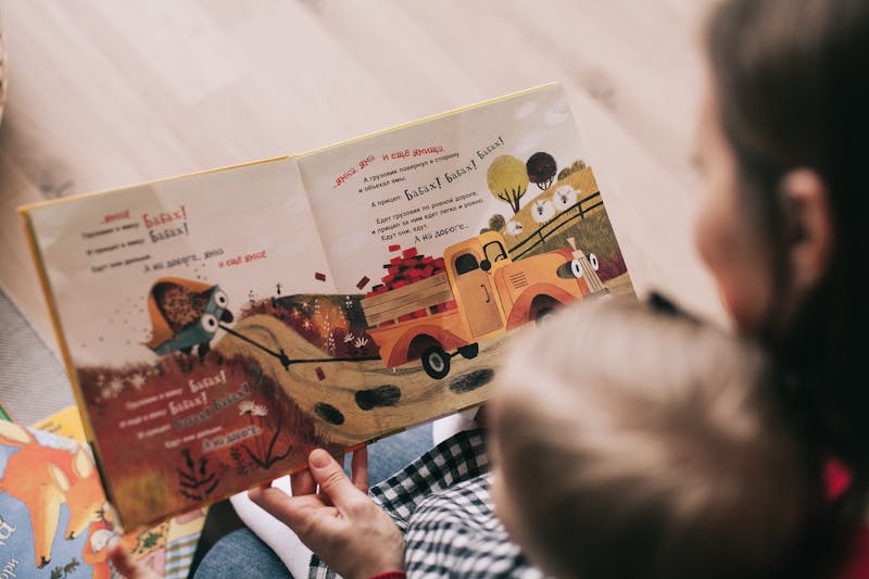 Books and travel maps on a wooden table